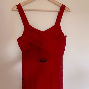 Brick red fall jumpsuit with peakaboo cutout and pockets!
